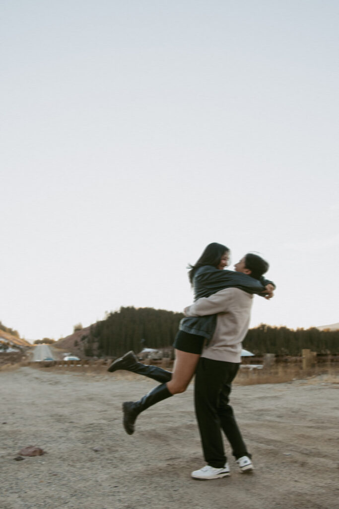 cute couple dancing during their photoshoot