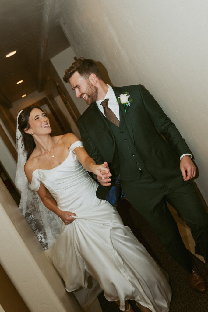 cute picture of the newlyweds smiling at each other