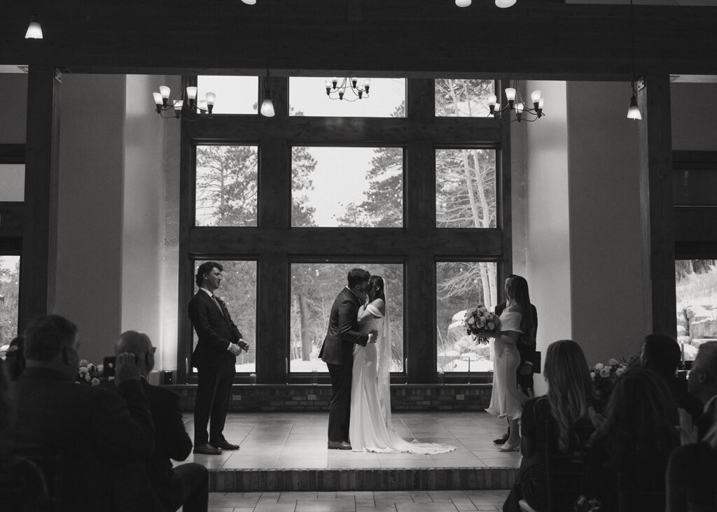 bride and groom, kissing after their ceremony