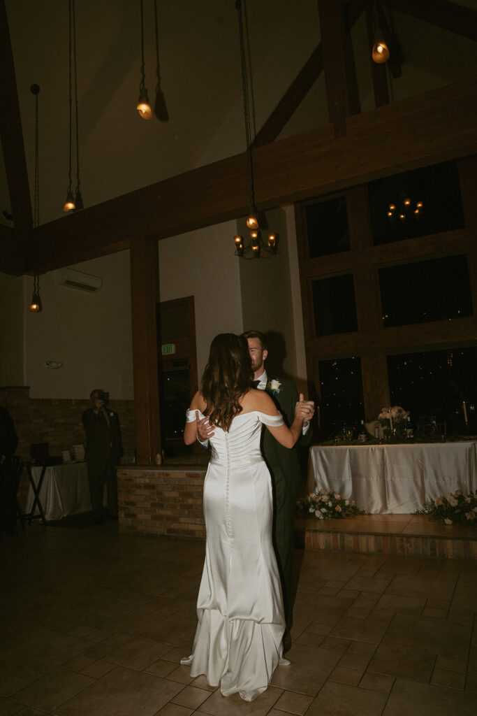 newlyweds at their first dance after the ceremony