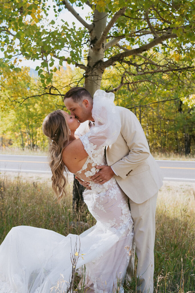 beautiful picture of the newly married kissing