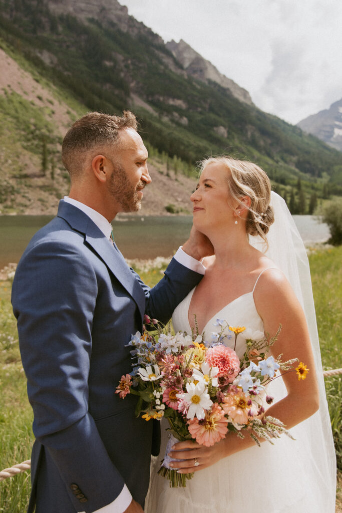 cute picture of the newlyweds smiling at each other