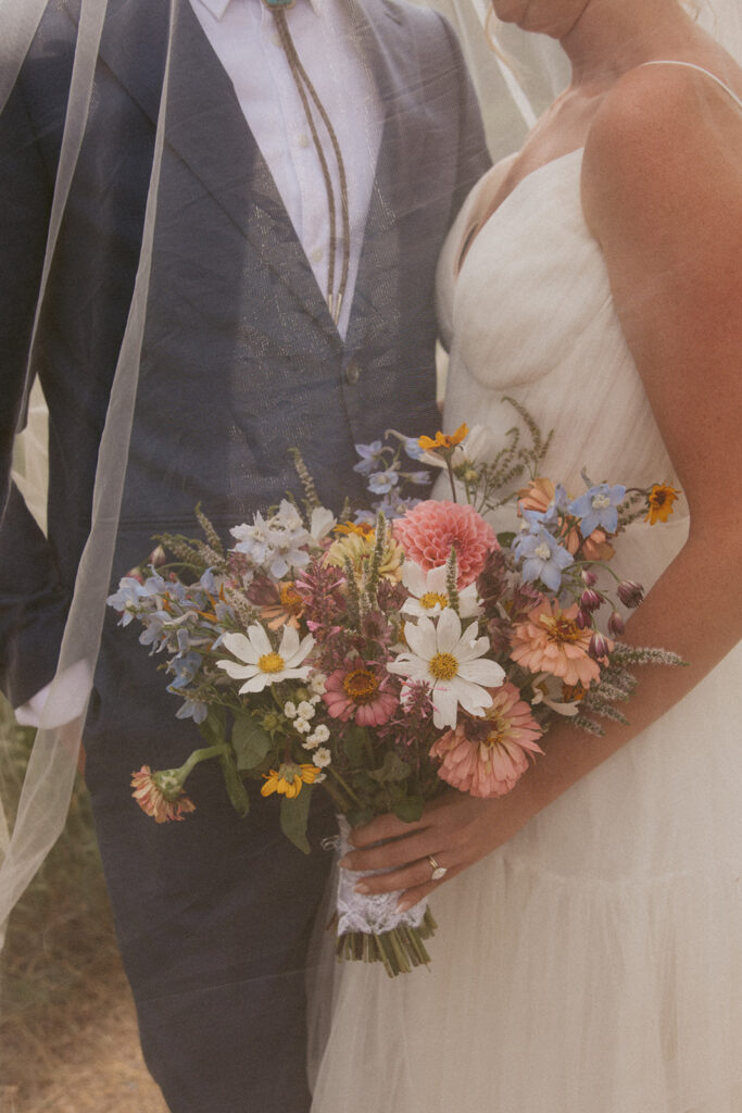 cute picture of the newlyweds holding hands