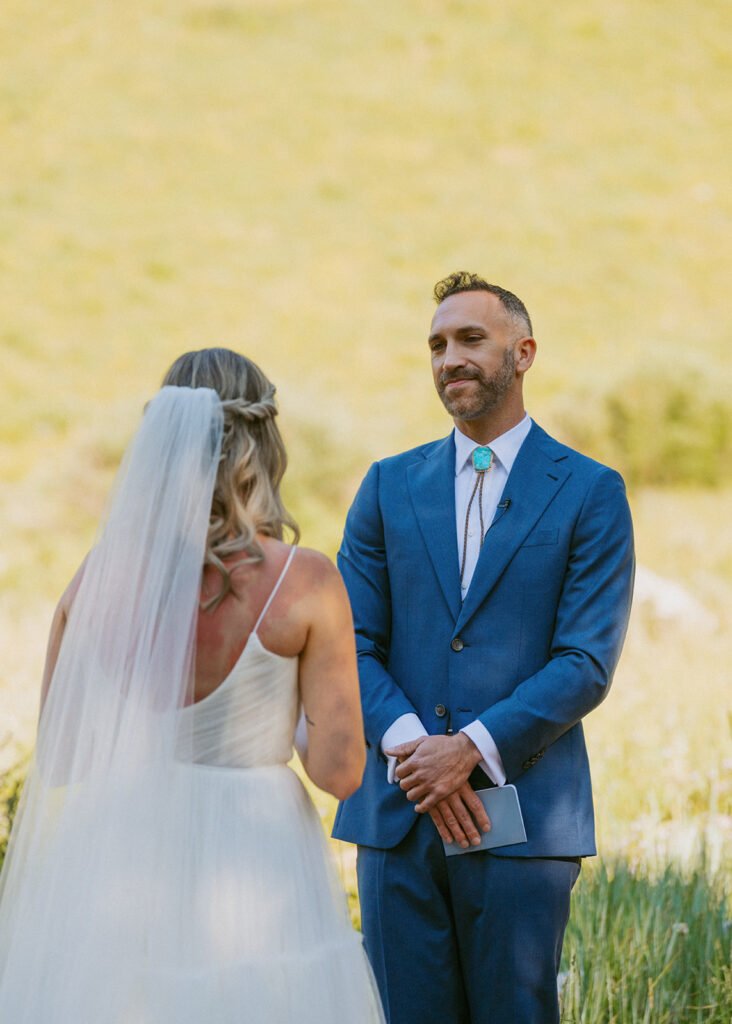 cute picture of the bride and groom at their first look