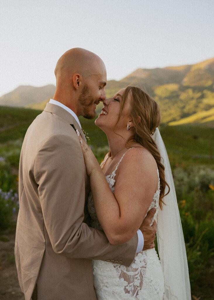 cute picture of the bride and groom smiling at each other