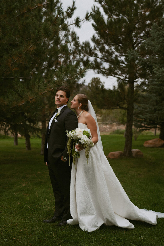 bride kissing the groom on the cheek