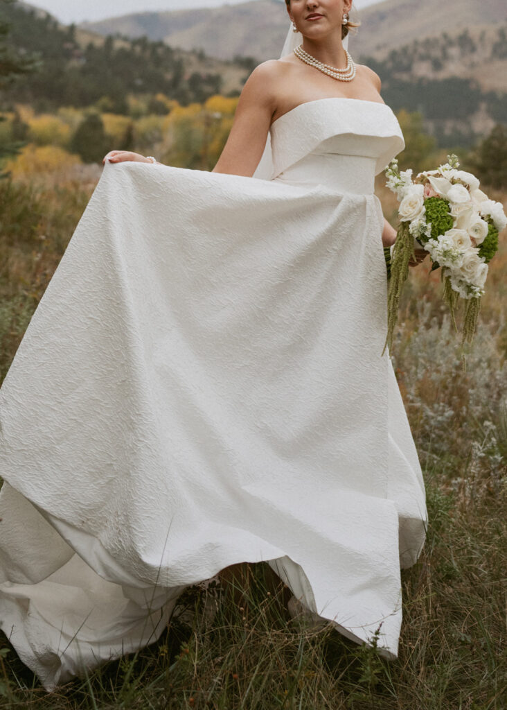 beautiful picture of the wedding dress and wedding bouquet