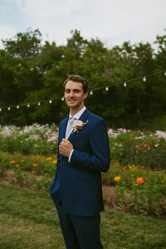 portrait of the groom before his first look with the bride