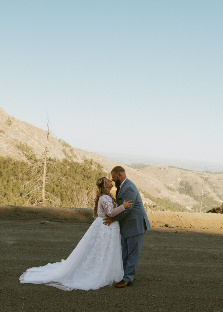 cute picture of the newlyweds kissing
