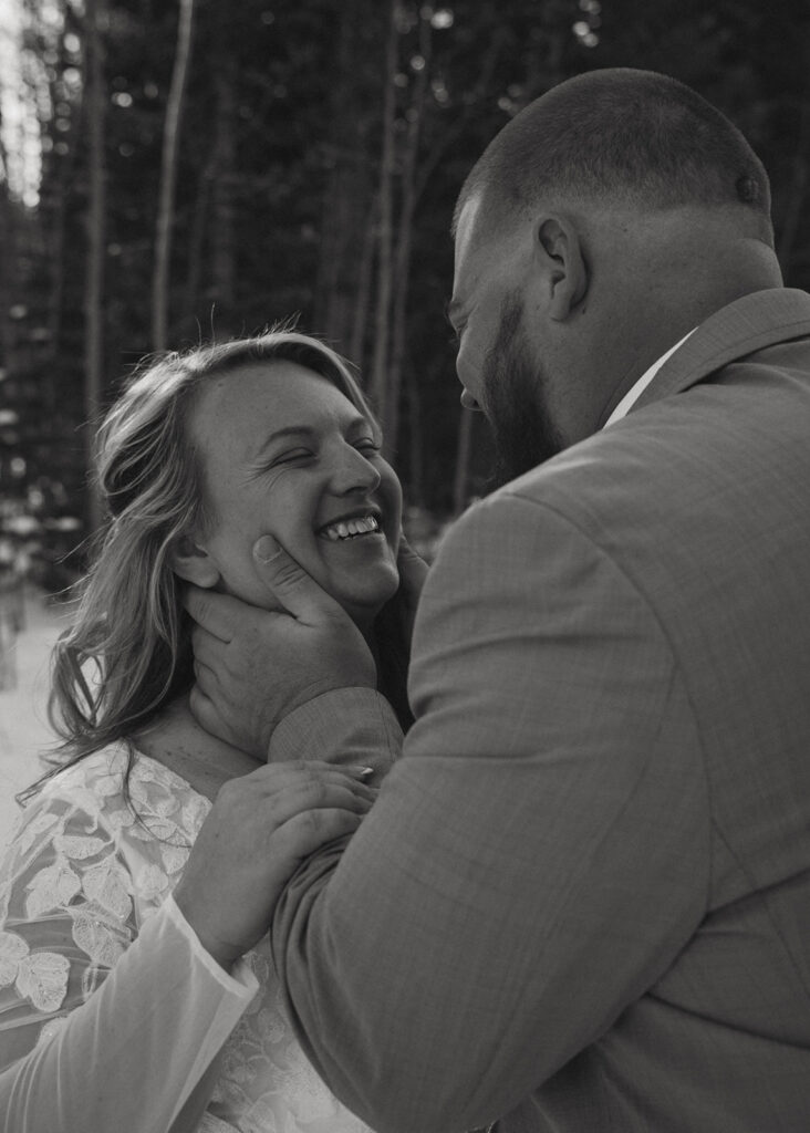 cute picture of the bride and groom smiling at each other