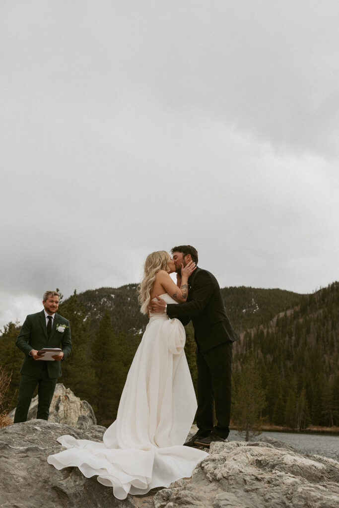 newlyweds kissing after their ceremony