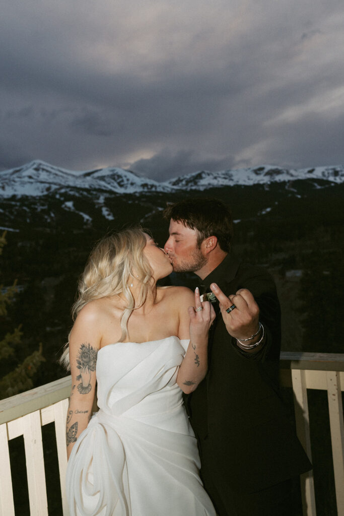 cute picture of the newlyweds kissing