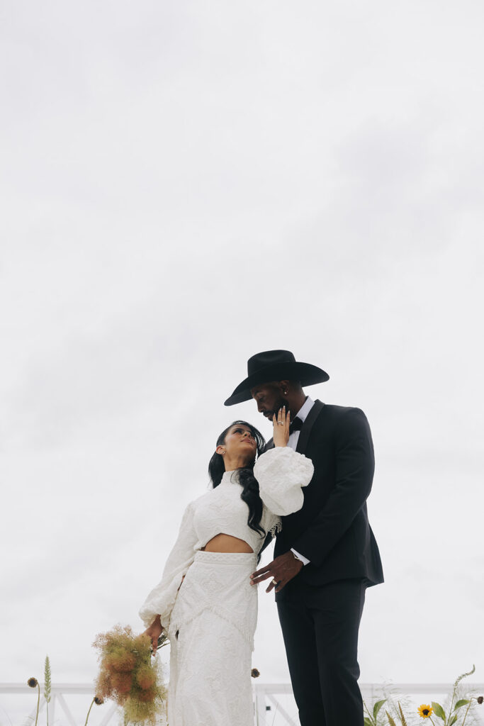 couple smiling at each other during their photoshoot