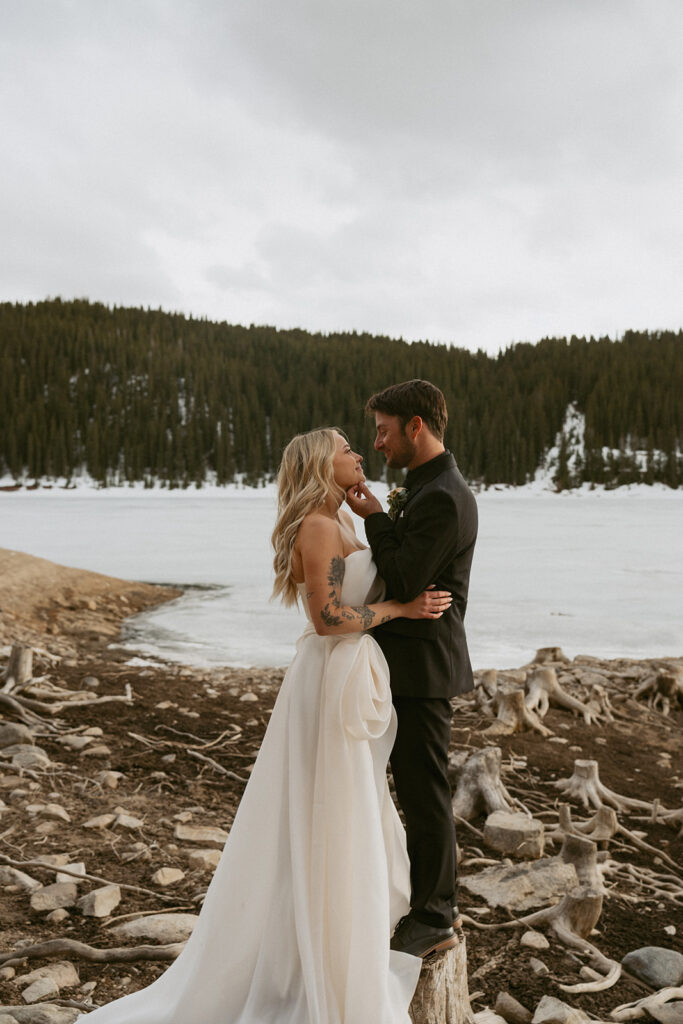 newlyweds laughing with each other during their photoshoot