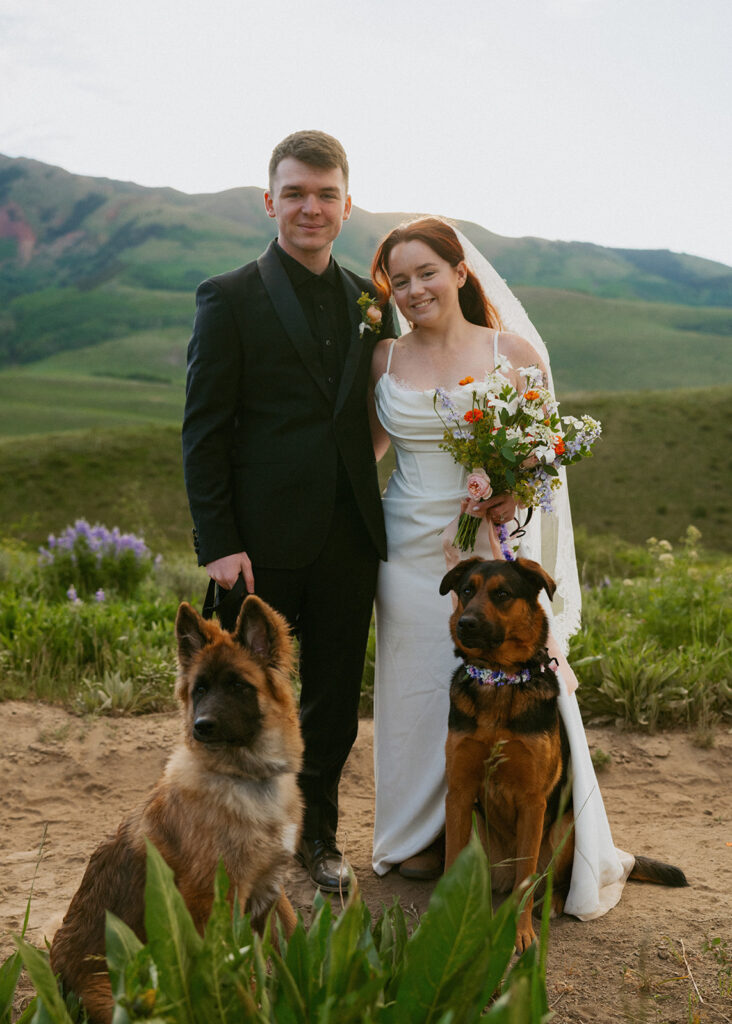 couple smiling at the camera during their photoshoot