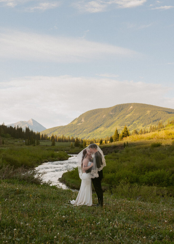 cute picture of the newlyweds laughing with each other