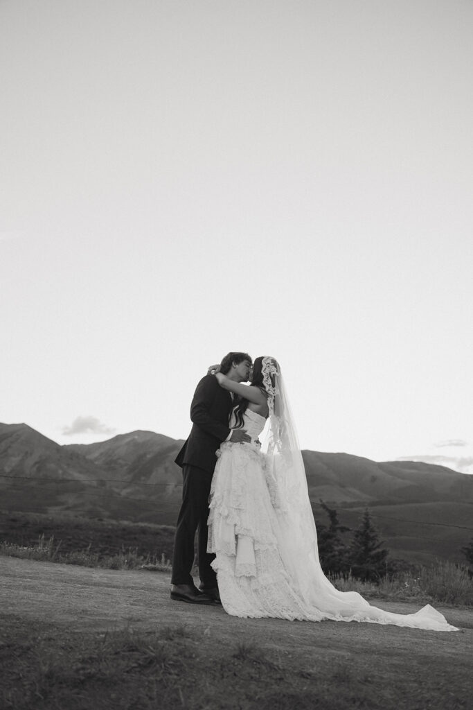 Beautiful picture of the bride and groom, kissing