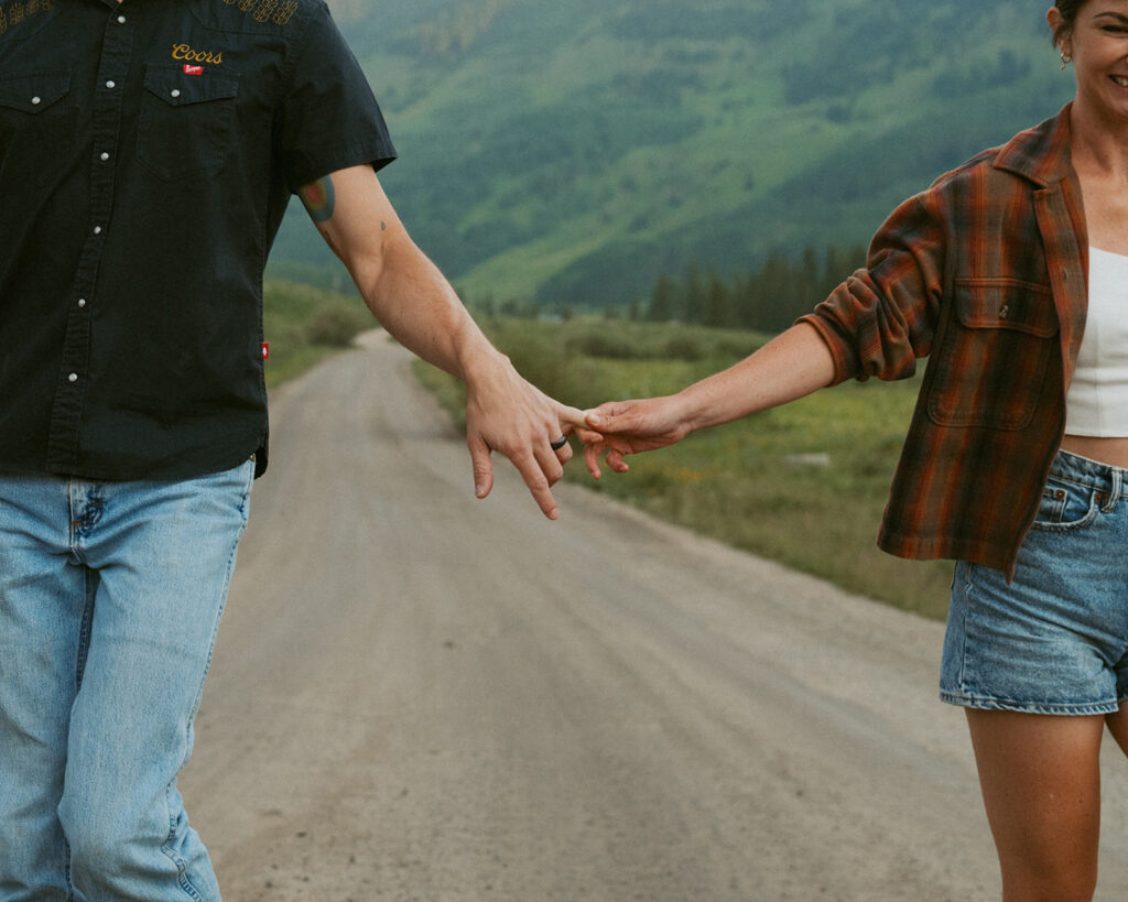 cute picture of the newlyweds holding hands