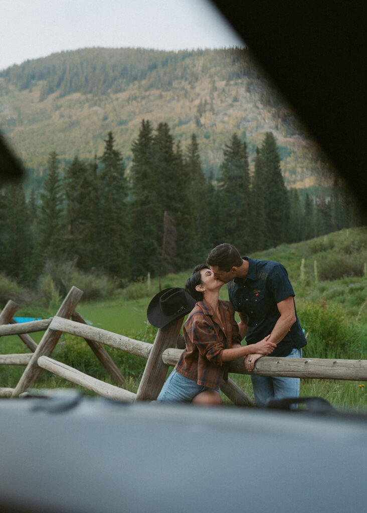 couple kissing during their photoshoot