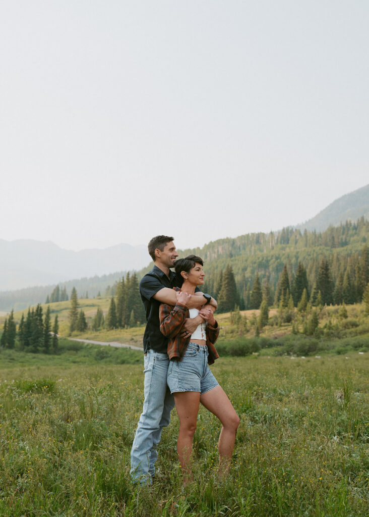 cute picture of the couple hugging during their photoshoot