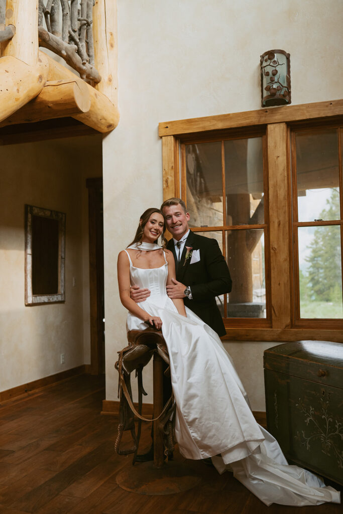 couple smiling at the camera during their photoshoot