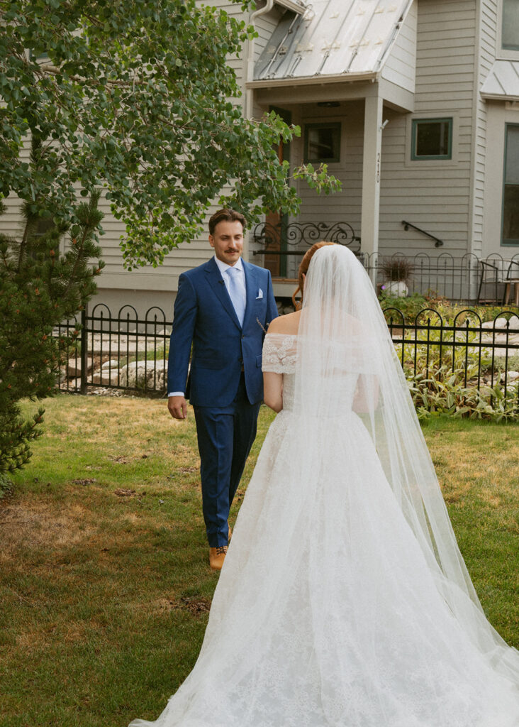 bride and groom emotional at their first look