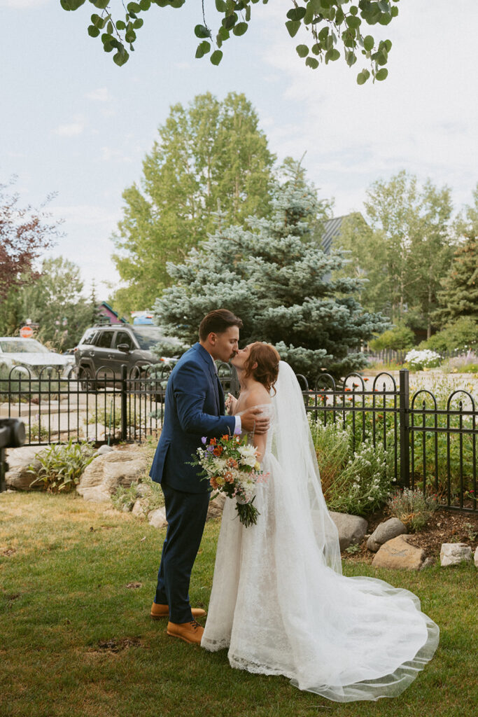 beautiful picture of the bride and groom kissing